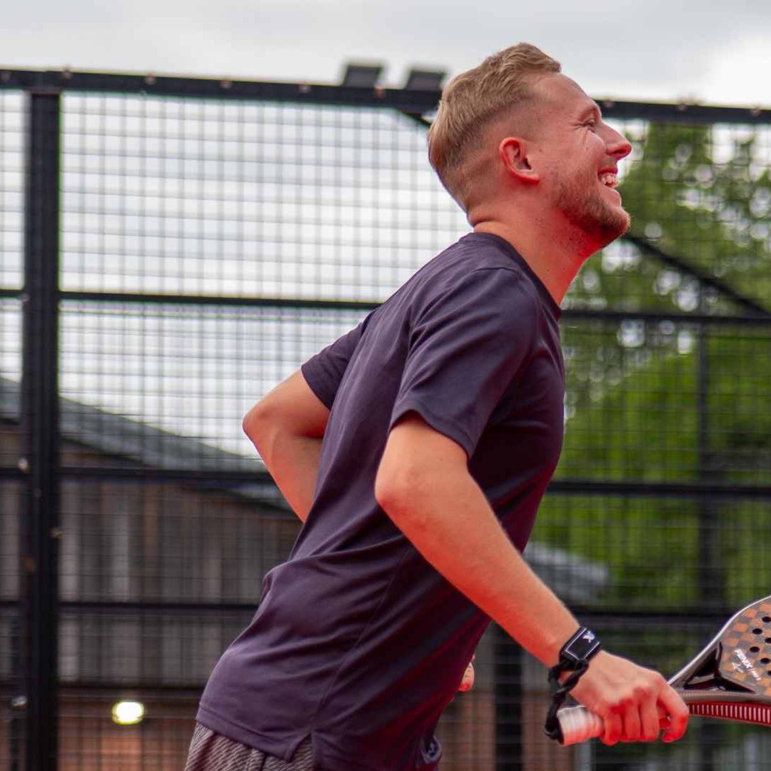 Elevate Padel Society - Player Smiling