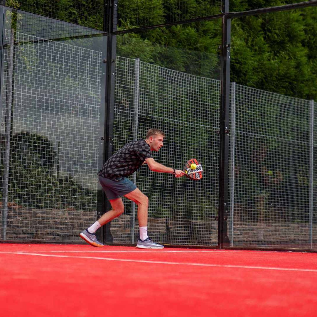 Padel Player Returning Shot