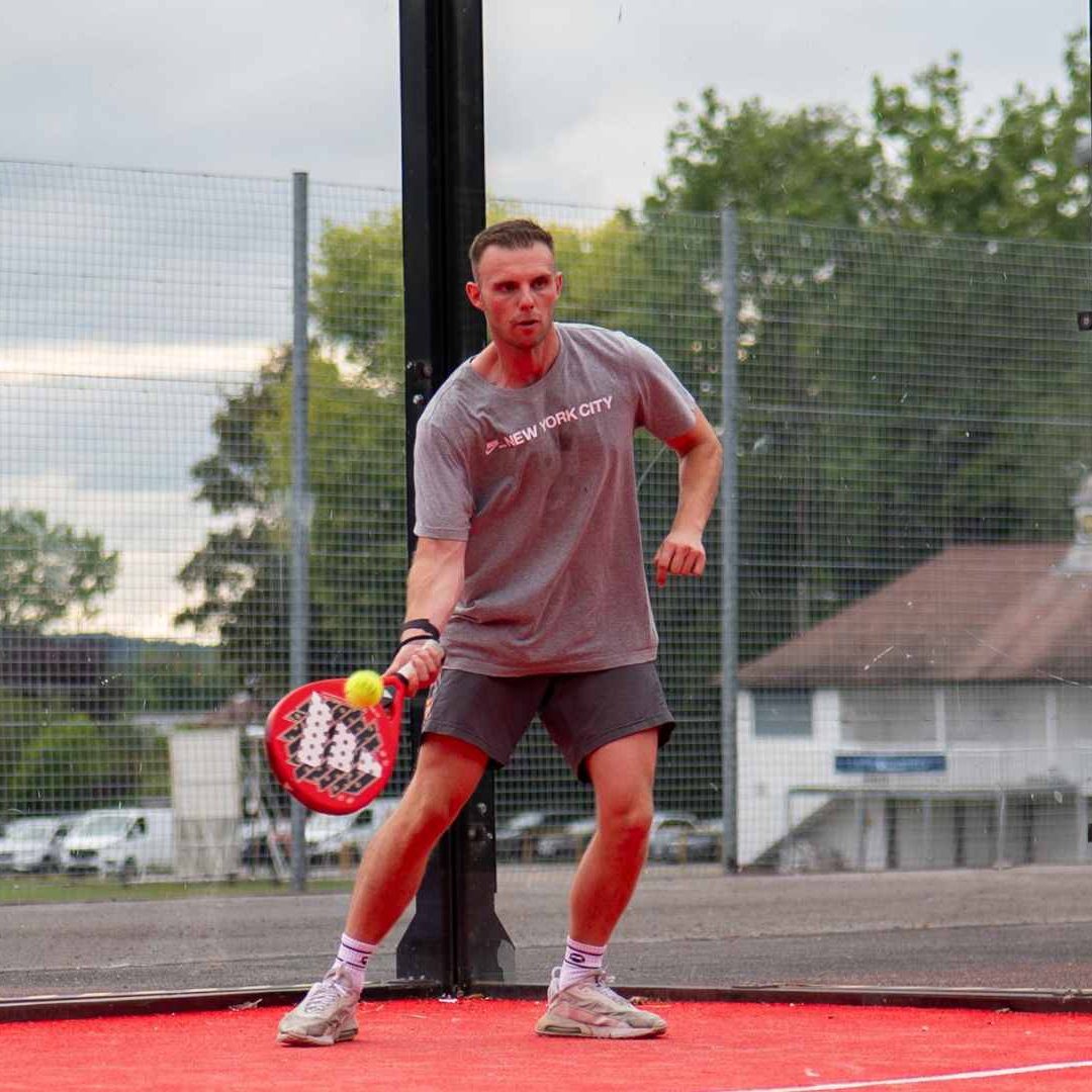 Padel Player Serving