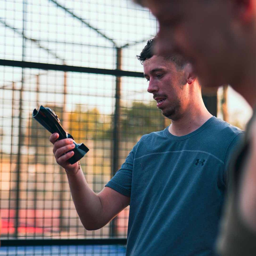 Padel Player With Trophy